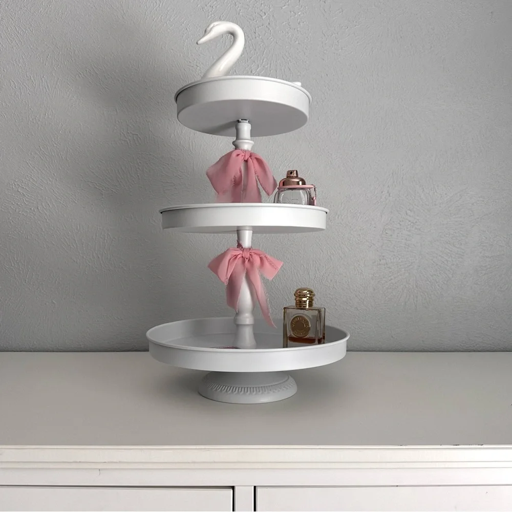 White Three-Tiered Stand with Pink Silk Bow Accents